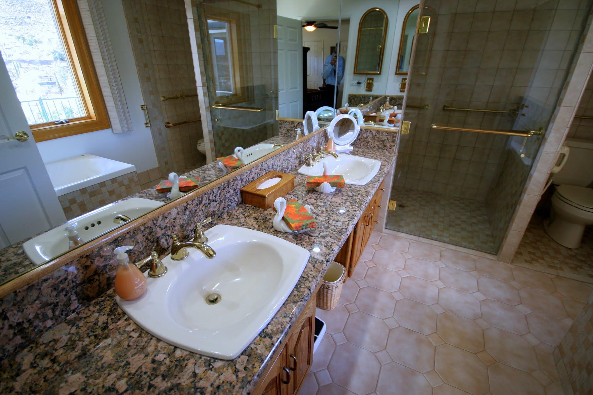 34421 Red Rover Mine Road Acton, CA 93510 - Photo 28 of 52 a bathroom with a sink mirror and vanity