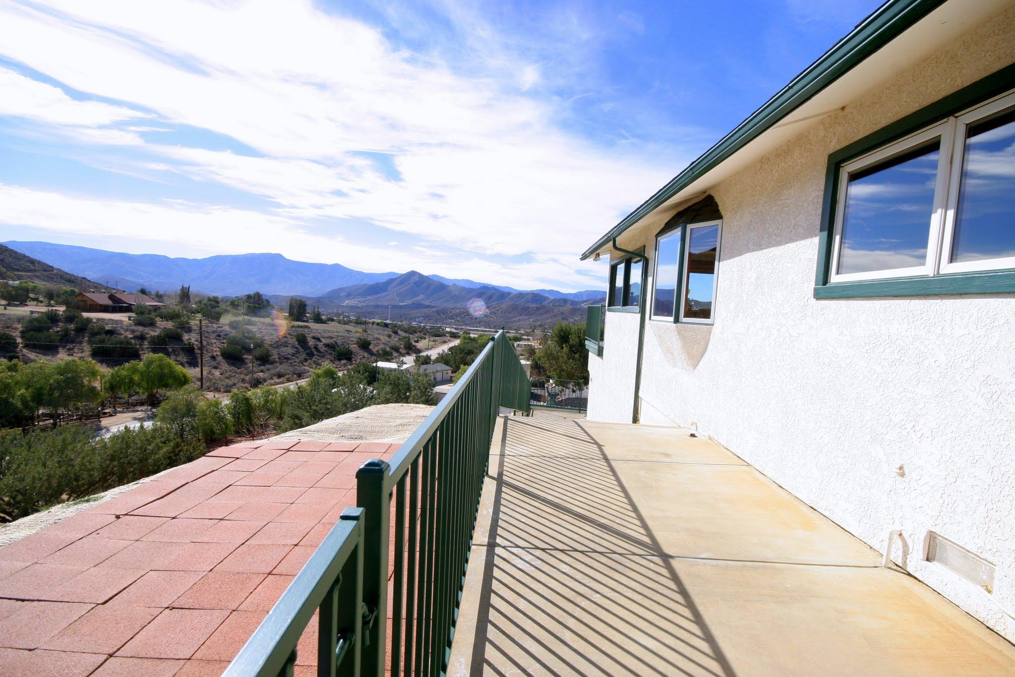 34421 Red Rover Mine Road Acton, CA 93510 - Photo 48 of 52 a view of house with yard and mountain view in back