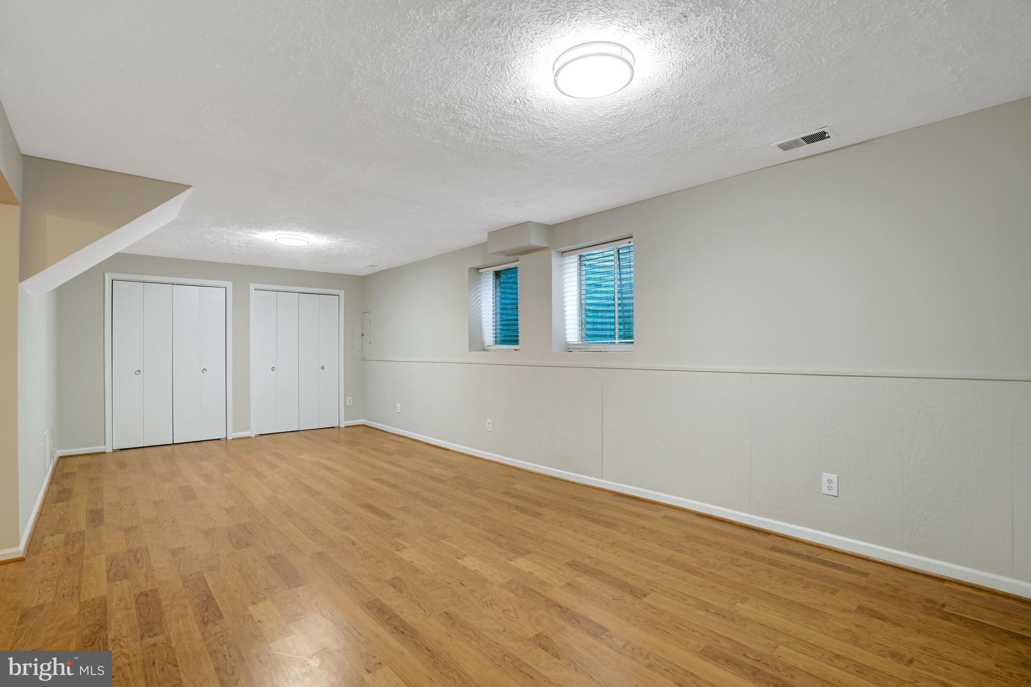 8523 Lakinhurst Lane Springfield, VA 22152 - Photo 54 of 76 Family room with 2 closets