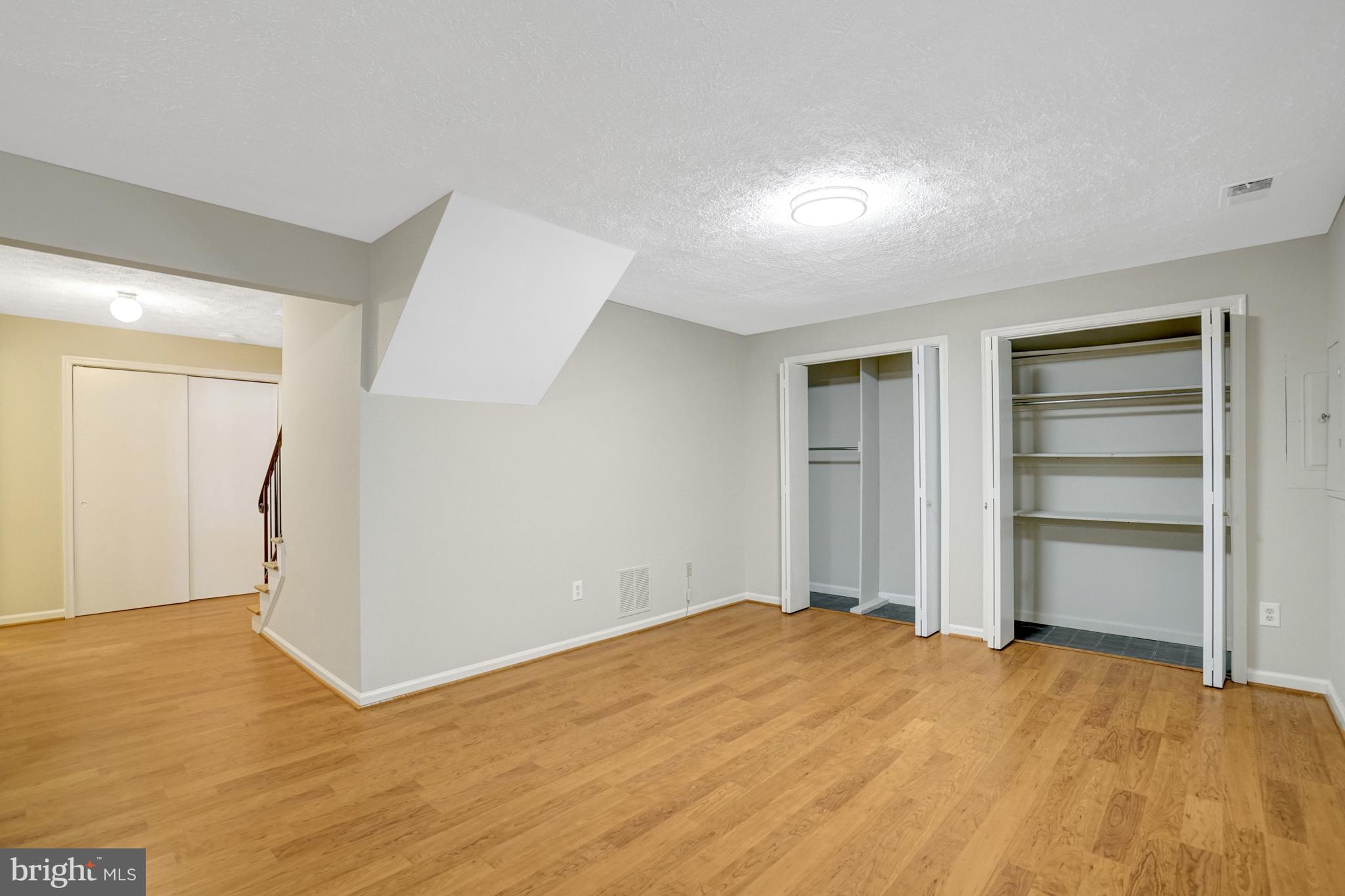 8523 Lakinhurst Lane Springfield, VA 22152 - Photo 55 of 76 Family room with 2 closets