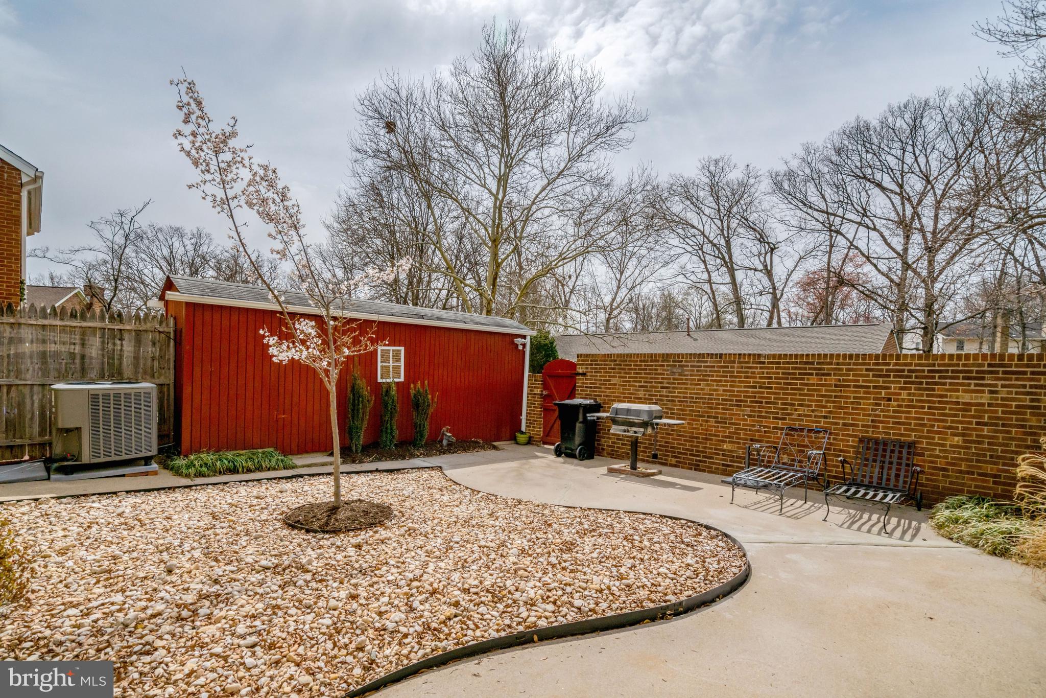 8523 Lakinhurst Lane Springfield, VA 22152 - Photo 61 of 76 Back yard with shed and built-in gas grill