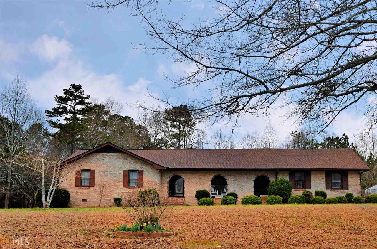 353 Rockwell Church Road Northeast Winder, GA 30680 - Photo 1 of 1 a view of house with a yard