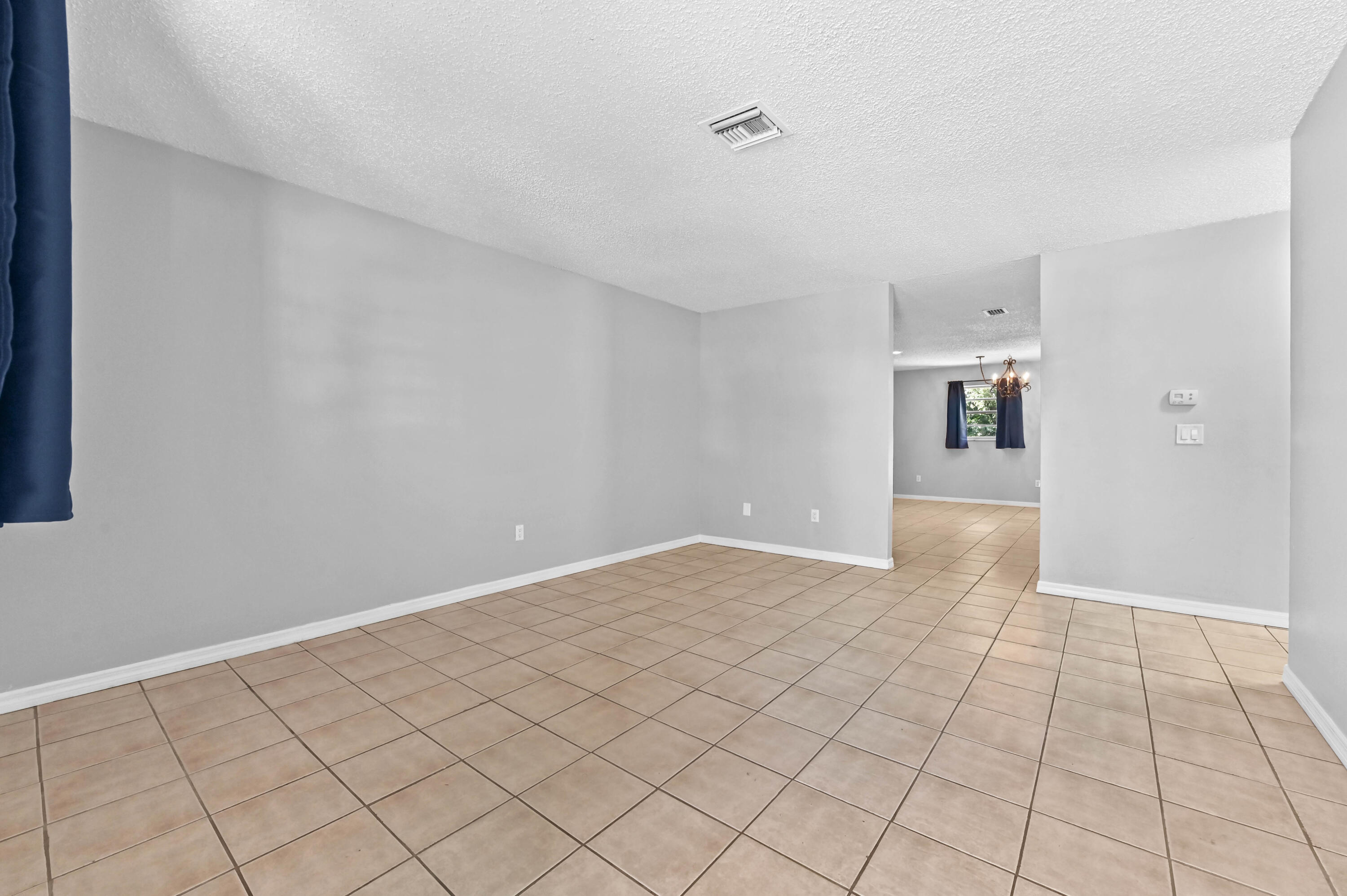 4548 Southeast Salvatori Road Stuart, FL 34997 - Photo 4 of 30 02 living room 01
