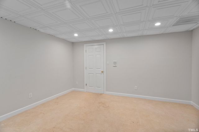 a living room with pool table and a flat screen tv