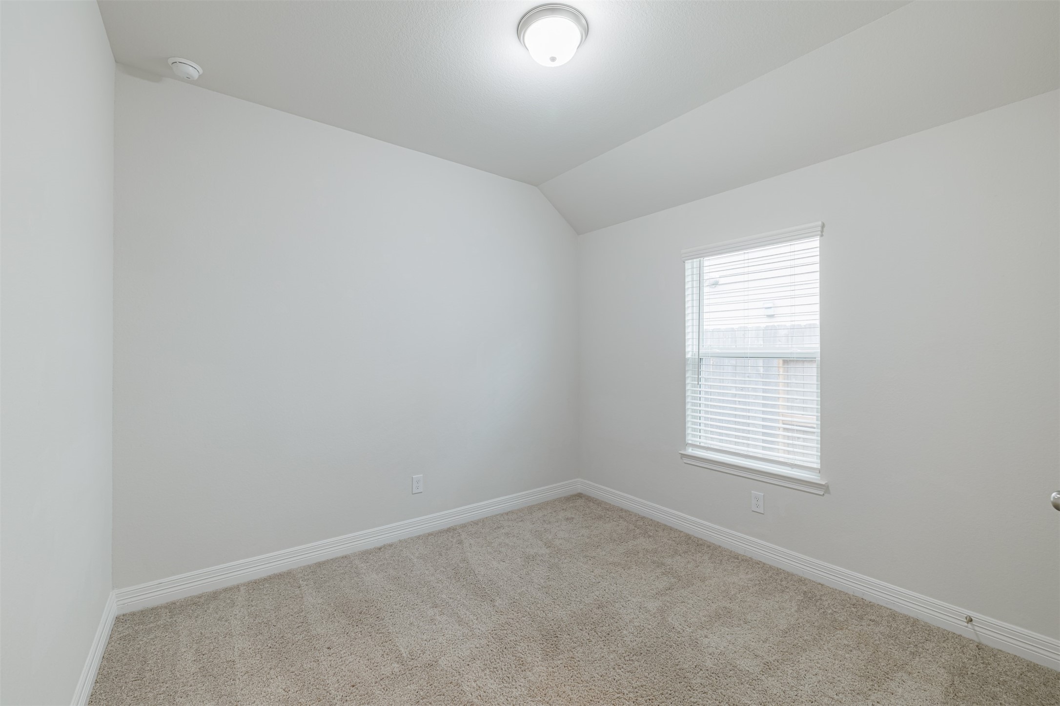 33118 School Hl Road Fulshear, TX 77441 - Photo 15 of 18 an empty room with a window