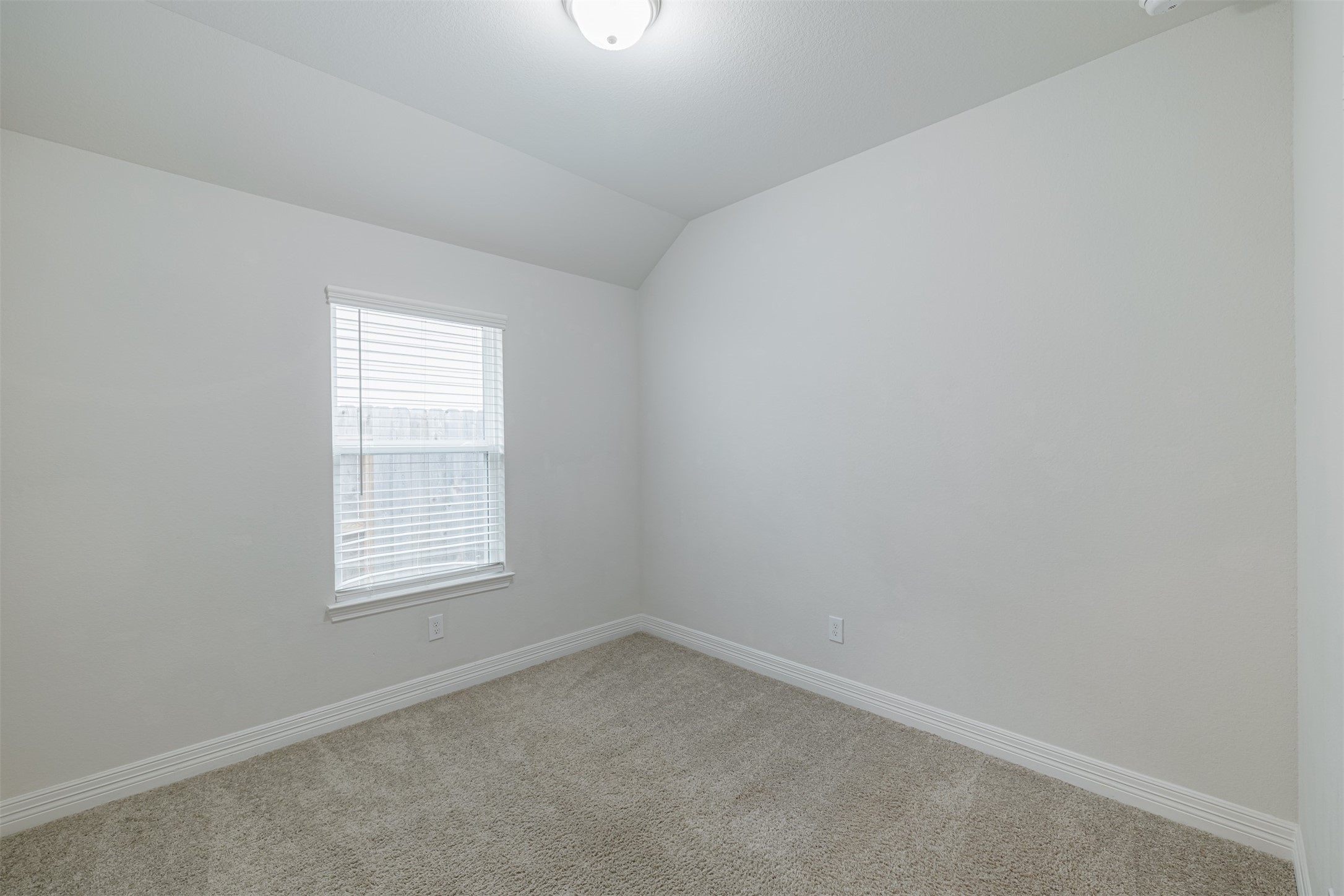 33118 School Hl Road Fulshear, TX 77441 - Photo 16 of 18 an empty room with a window