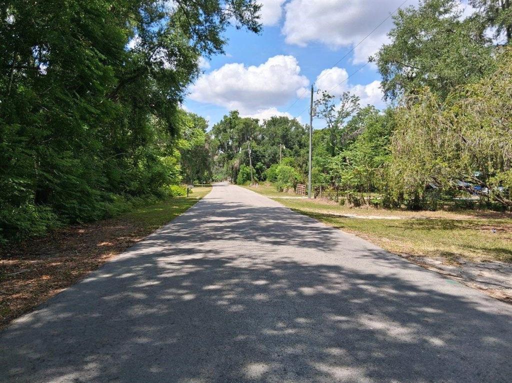 Northwest 2nd Street Webster, FL 33597 - Photo 2 of 4 a view of a street