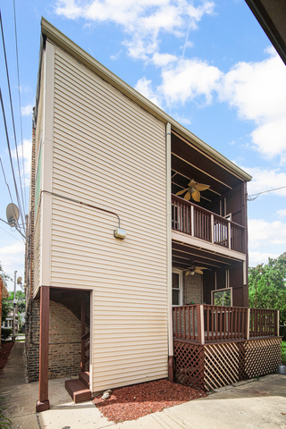 1007 South Austin Boulevard, Unit 1 Chicago, IL 60644 - Photo 15 of 15 a front view of a house