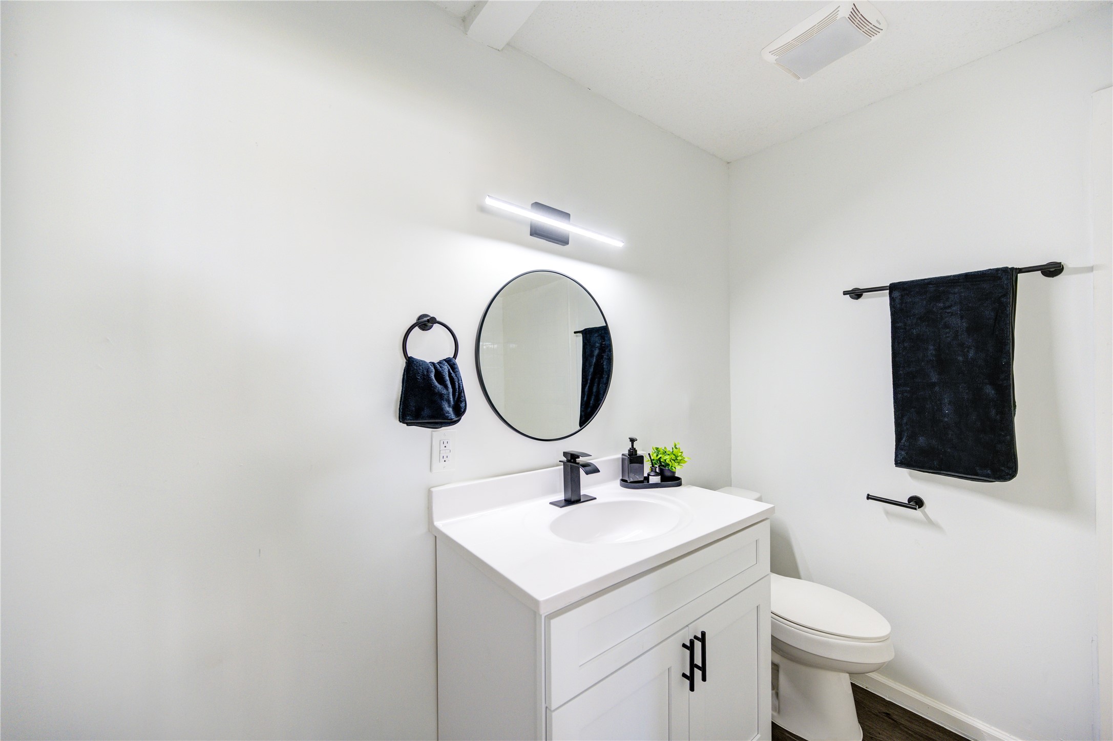 12127 Palmton Street Houston, TX 77034 - Photo 25 of 31 a bathroom with a sink and a mirror