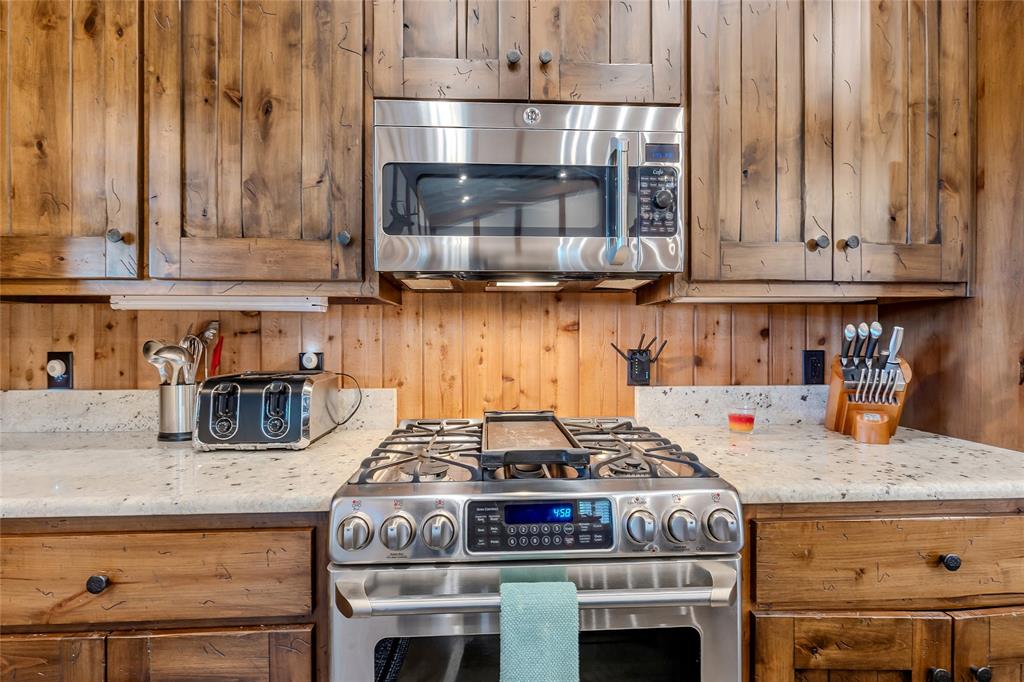 830 County Road 1439 Yantis, TX 75497 - Photo 13 of 40 Granite counters, 2-gas burning ranges - both with convection ovens