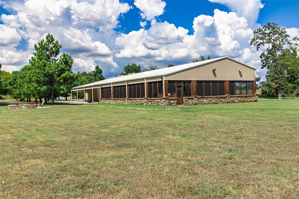 830 County Road 1439 Yantis, TX 75497 - Photo 2 of 40 Over 4800ft of barndominium-style lodging with two levels. Sells furnished