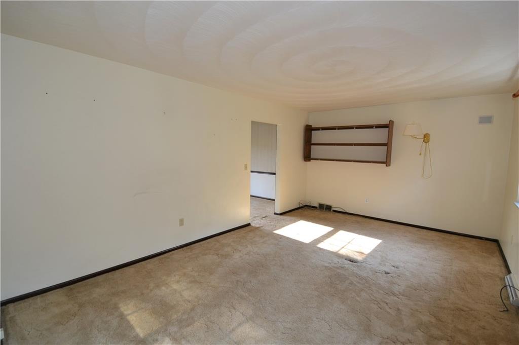 276 State Road Valencia, PA 16059 - Photo 3 of 13 Living Room approximately 18 x 12 with natural light, neutral decor and a detailed ceiling