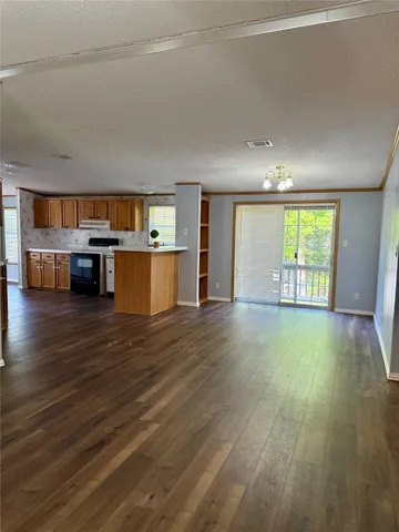 a living room with a wooden floor