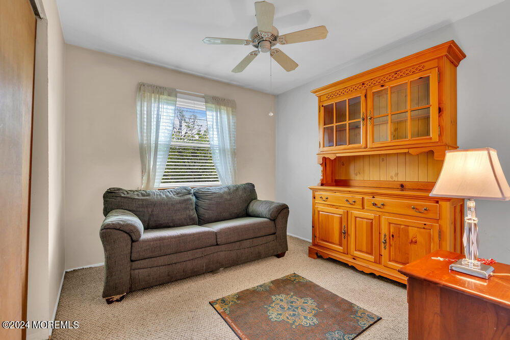 95 Solar Drive Brick, NJ 08724 - Photo 15 of 35 a living room with furniture and a window