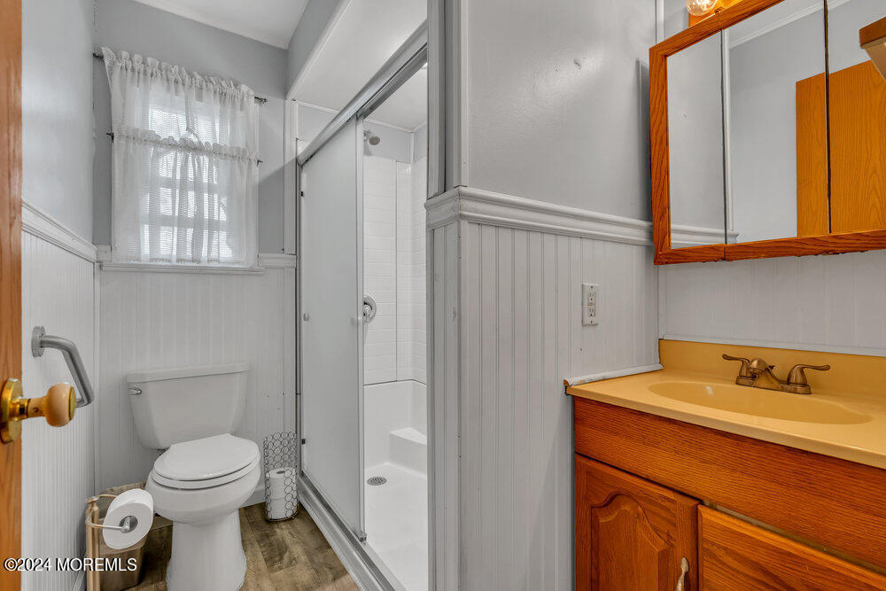 95 Solar Drive Brick, NJ 08724 - Photo 17 of 35 a bathroom with a sink and a toilet