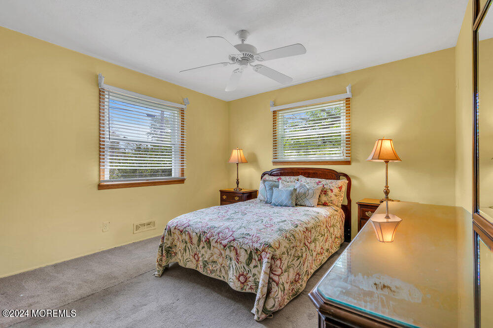 95 Solar Drive Brick, NJ 08724 - Photo 19 of 35 a bedroom with a bed and window