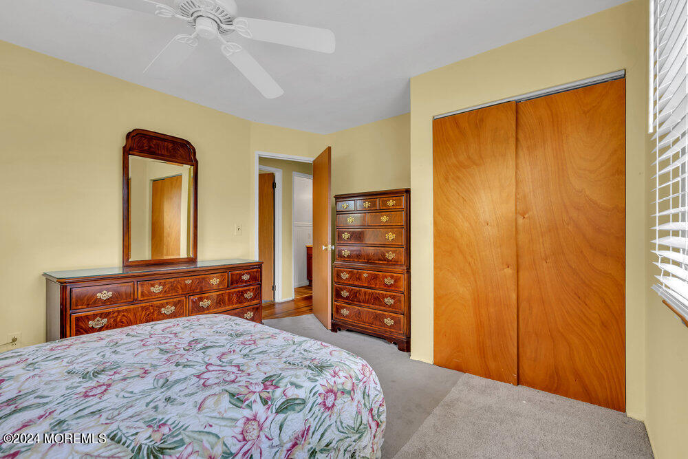 95 Solar Drive Brick, NJ 08724 - Photo 20 of 35 a bedroom with a bed and a dresser