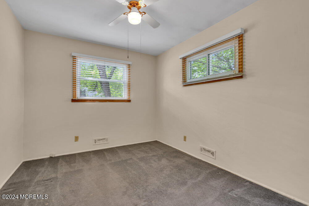 95 Solar Drive Brick, NJ 08724 - Photo 21 of 35 a view of an empty room with a window