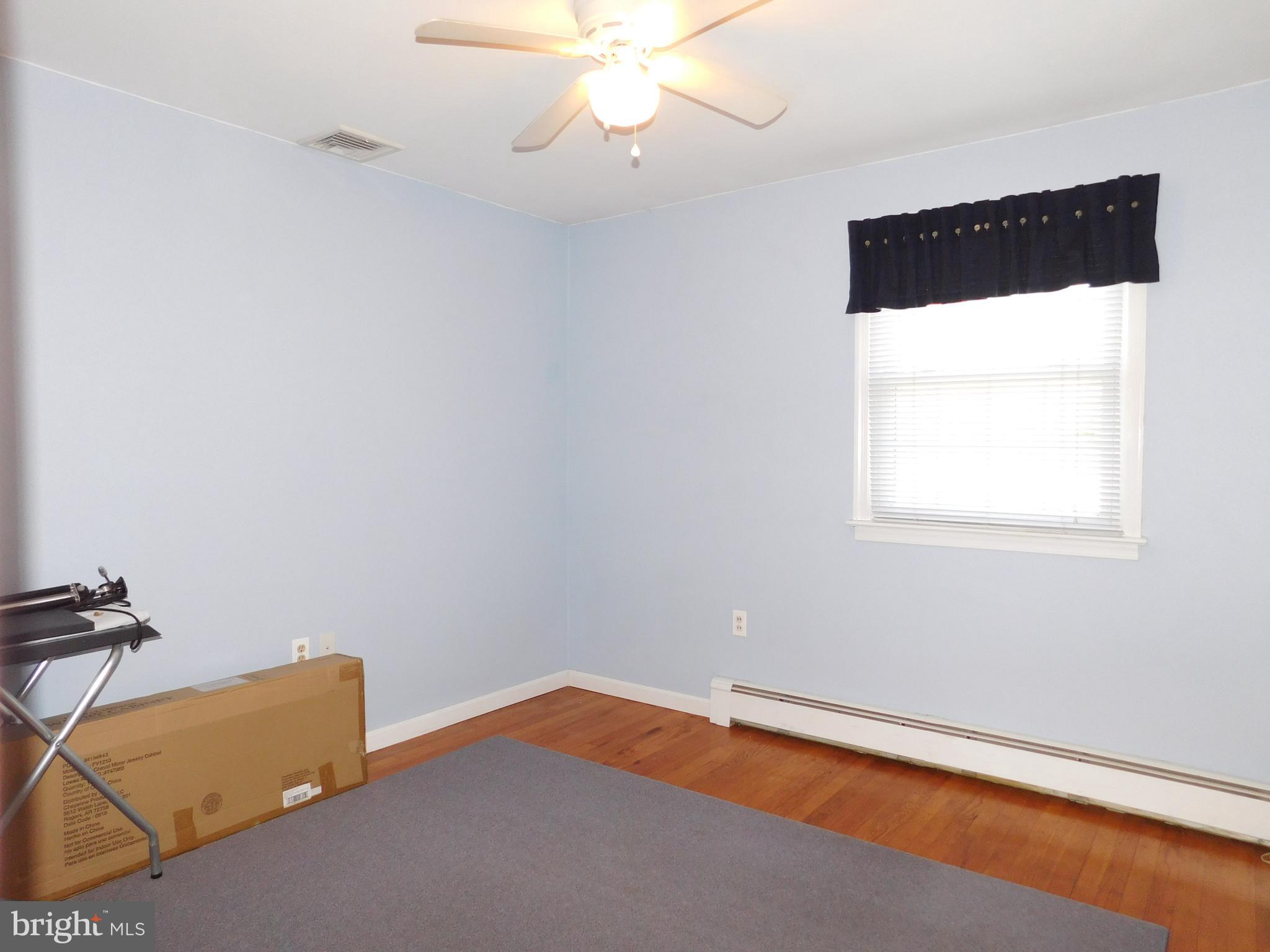 35 Stoopville Road Newtown, PA 18940 - Photo 31 of 78 Bedroom 3 with hardwood floors and ceiling fan