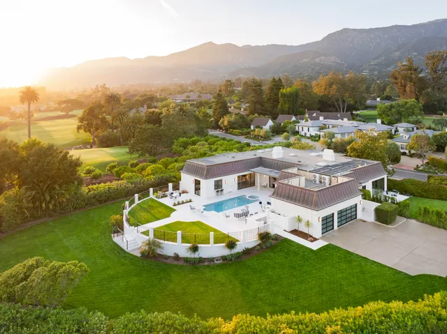a view of a house with a big yard