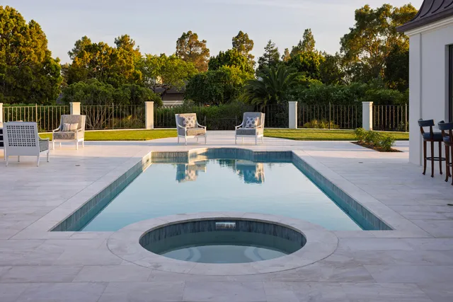 outdoor view with swimming pool and fire pit