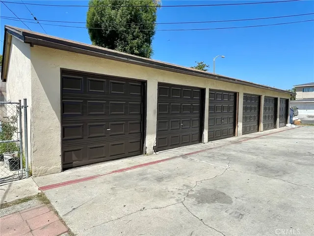 a view of the house with a garage