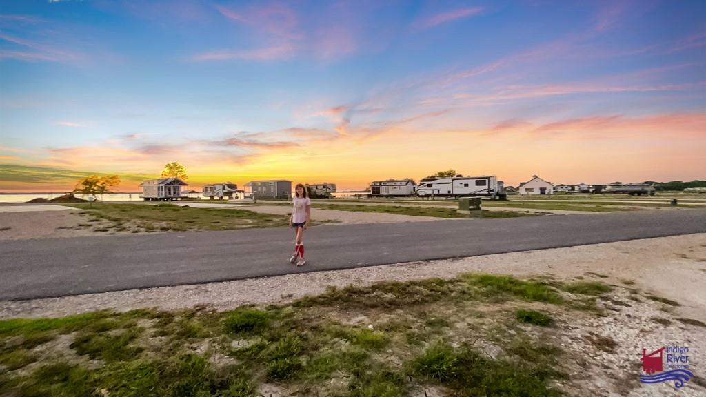 6397 Peninsula Road, Unit 132 Kerens, TX 75144 - Photo 15 of 15 a view of a lake with a big yard