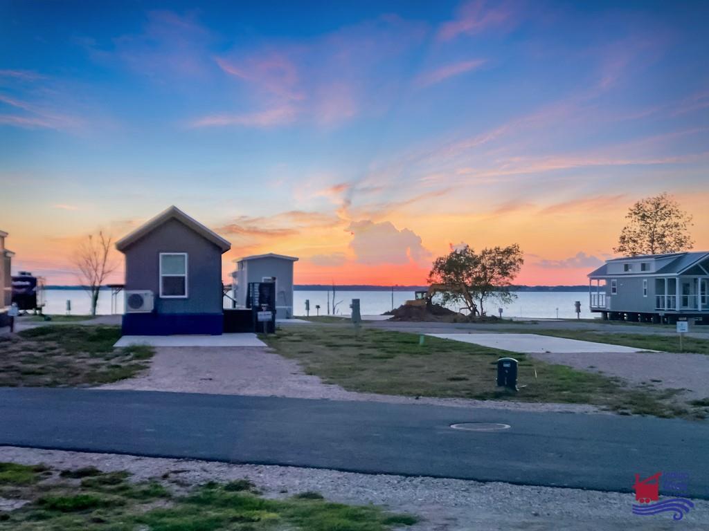 6397 Peninsula Road, Unit 132 Kerens, TX 75144 - Photo 10 of 15 front view of a house with a yard