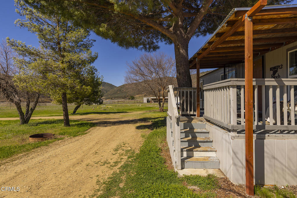 7343 Rose Valley Road Ojai, CA 93023 - Photo 14 of 50 a view of a house with backyard and sitting area