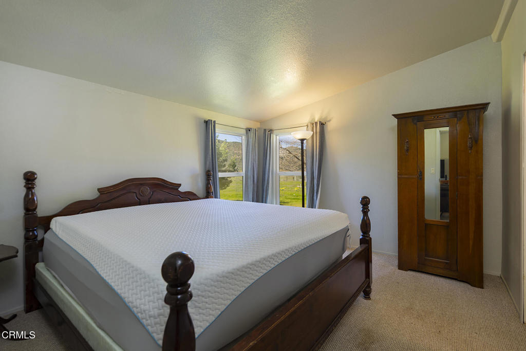 7343 Rose Valley Road Ojai, CA 93023 - Photo 27 of 50 a bed sitting in a bedroom next to a window