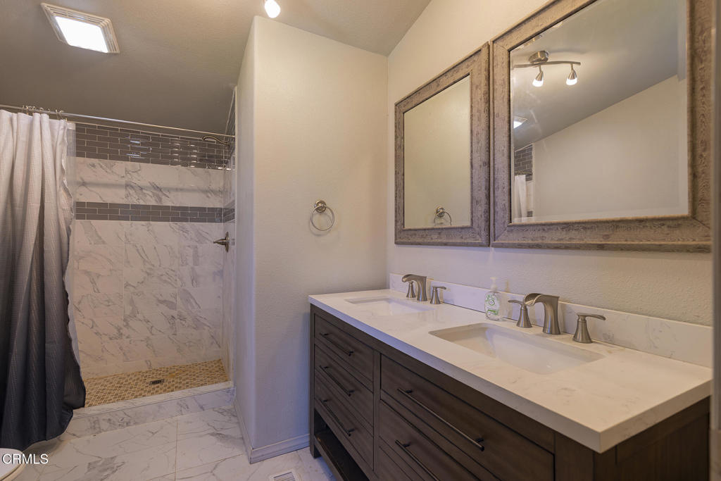 7343 Rose Valley Road Ojai, CA 93023 - Photo 28 of 50 a bathroom with a sink and a mirror