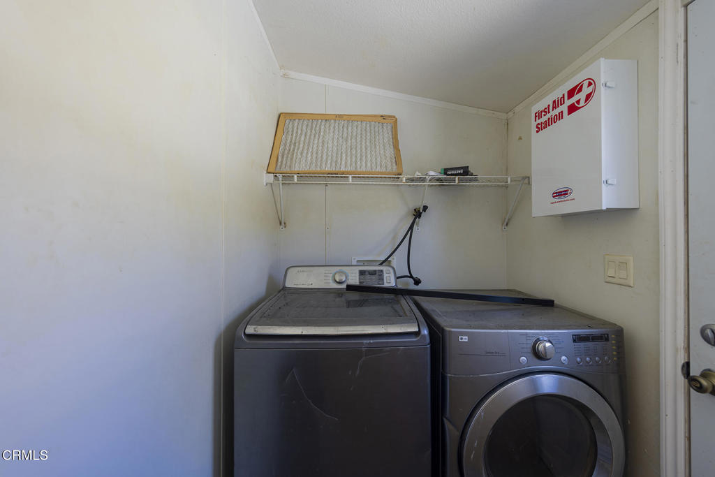 7343 Rose Valley Road Ojai, CA 93023 - Photo 29 of 50 a utility room with dryer and washer