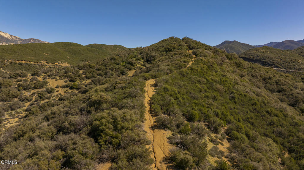 7343 Rose Valley Road Ojai, CA 93023 - Photo 48 of 50 a view of a mountain range in a cloudy sky