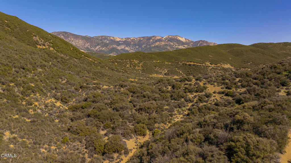 7343 Rose Valley Road Ojai, CA 93023 - Photo 49 of 50 a view of a mountain range in a cloudy sky