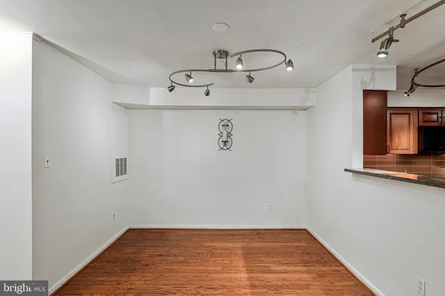 a view of a storage & utility room with a sink