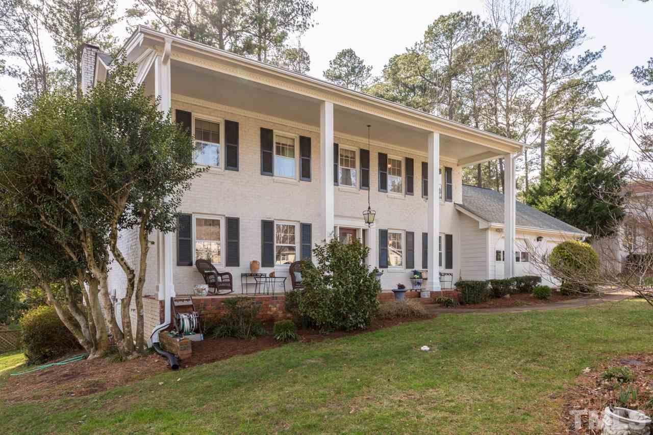 7616 Harps Mill Road Raleigh, NC 27615 - Photo 2 of 24 Mostly brick exterior with some fiber cement siding. 2 Car Garage. New Roof!