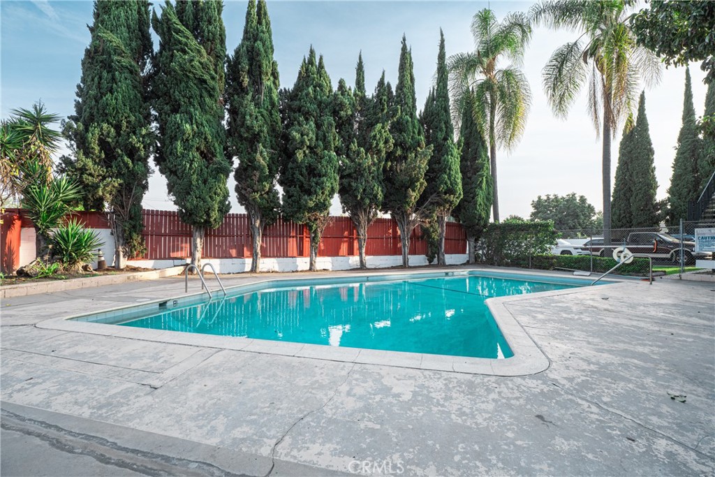 7348 Florence Avenue, Unit 4 Downey, CA 90240 - Photo 10 of 16 a view of a park with palm trees