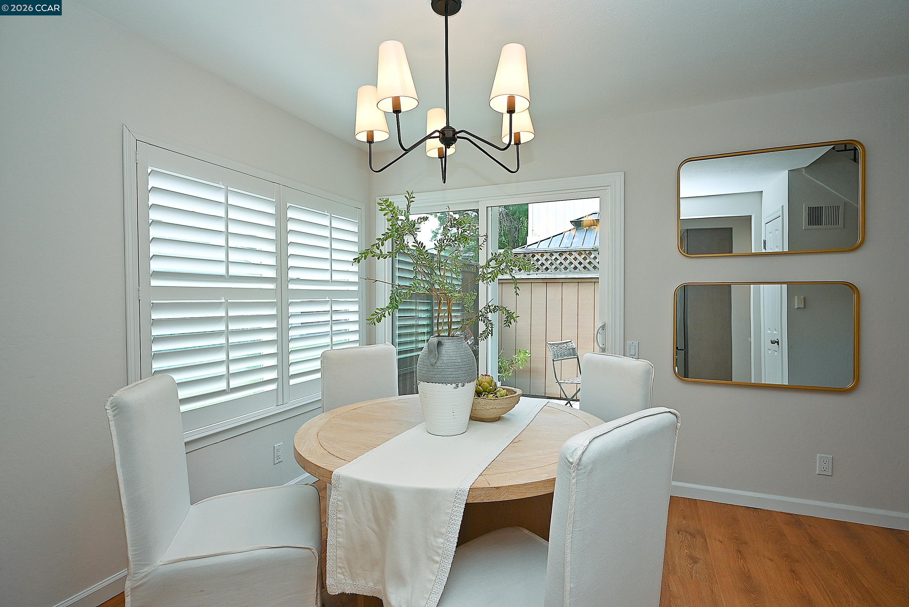 4284 Dubhe Court Concord, CA 94521 - Photo 11 of 46 a dining room with furniture and window