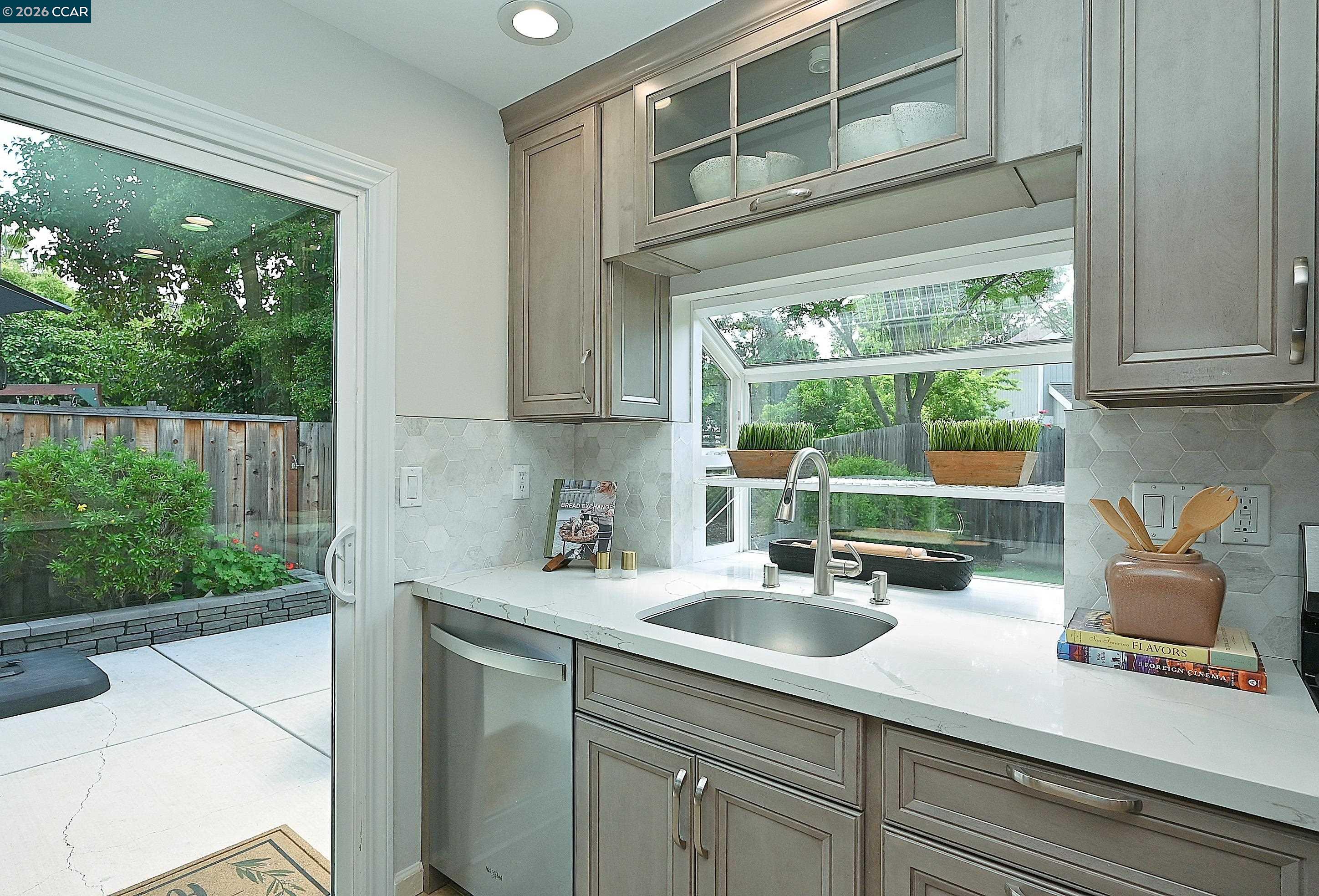 4284 Dubhe Court Concord, CA 94521 - Photo 18 of 46 a kitchen with a sink and a large window