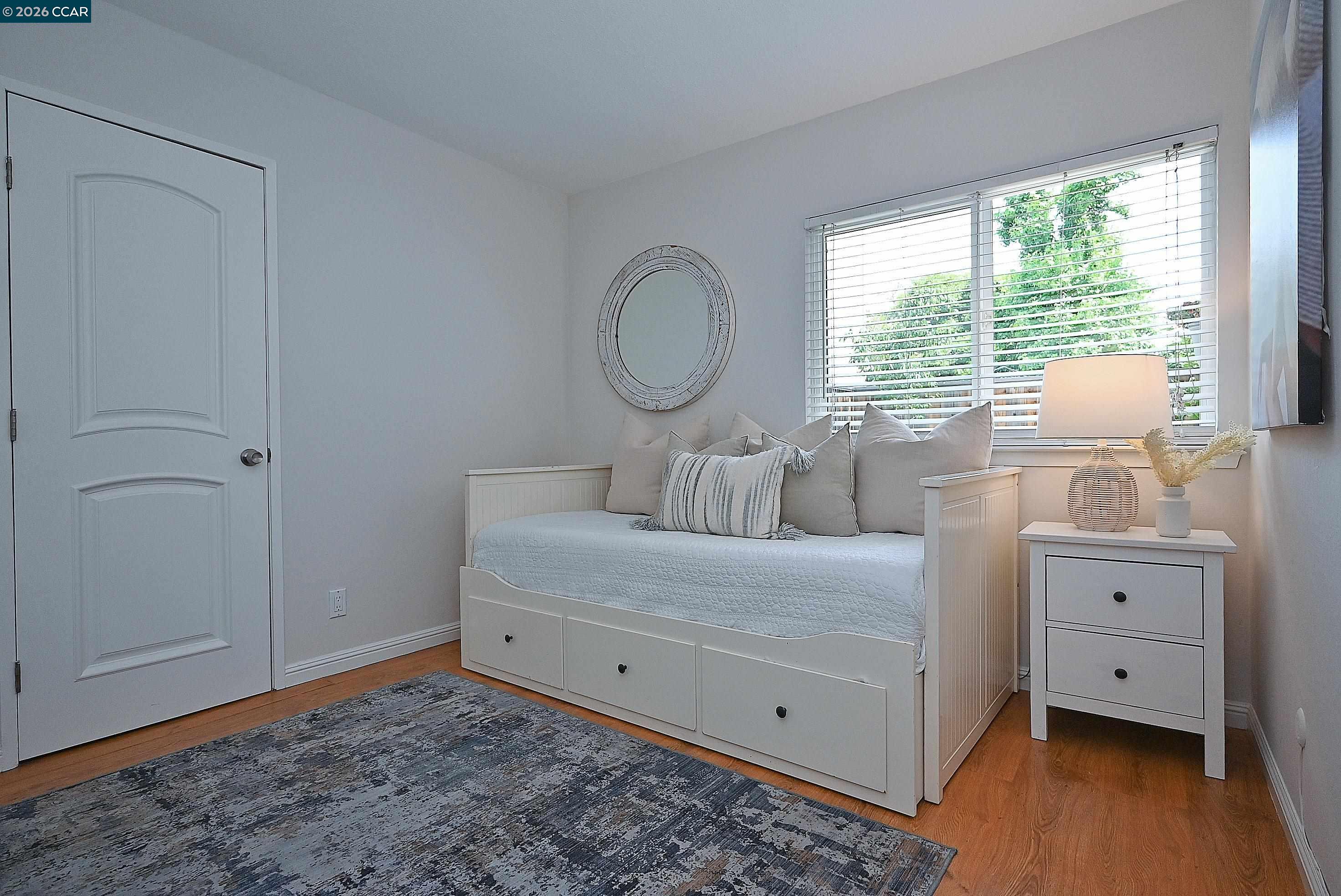 4284 Dubhe Court Concord, CA 94521 - Photo 22 of 46 a living room with furniture and a window