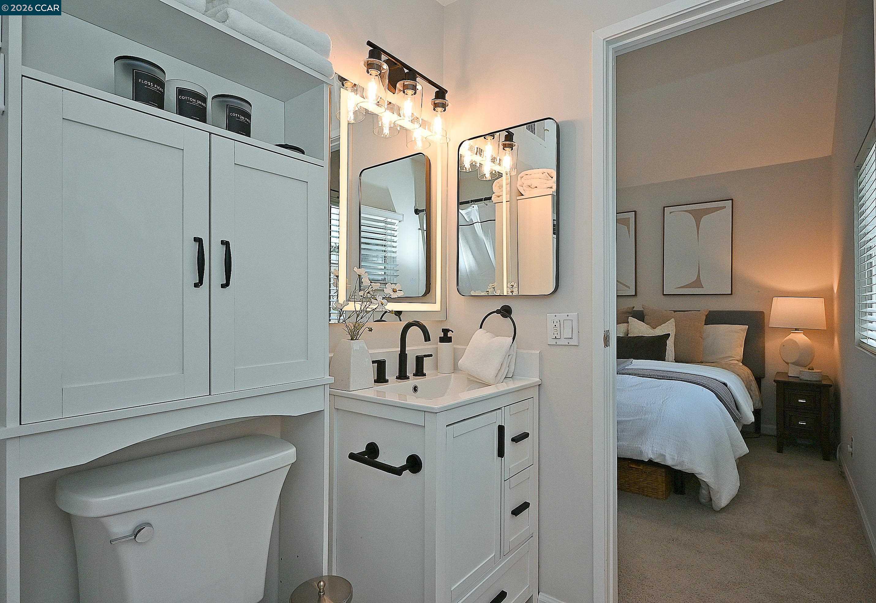 4284 Dubhe Court Concord, CA 94521 - Photo 31 of 46 a en suite bathroom with a double vanity sink a mirror and shower