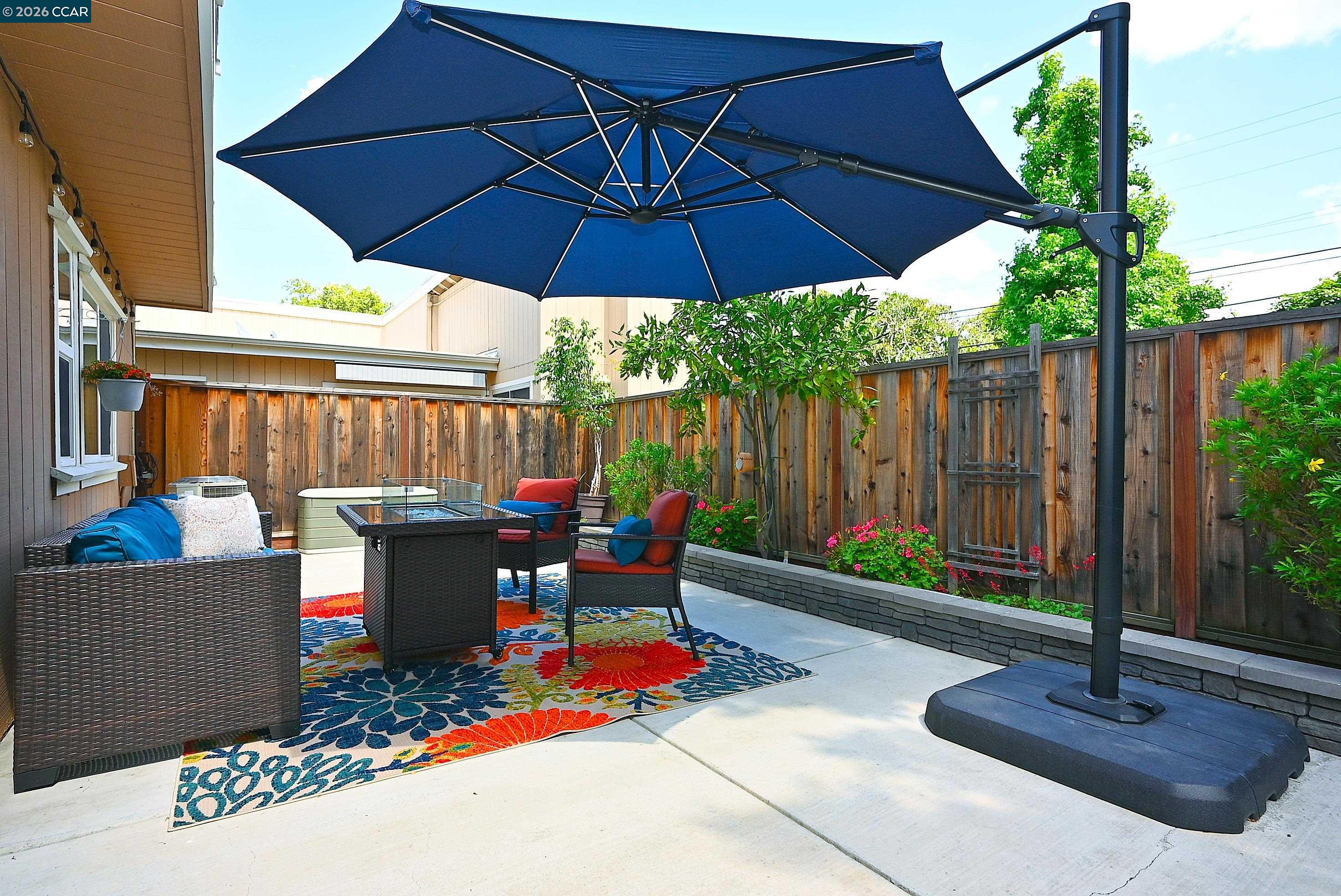 4284 Dubhe Court Concord, CA 94521 - Photo 39 of 46 a view of a deck with furniture and wooden fence