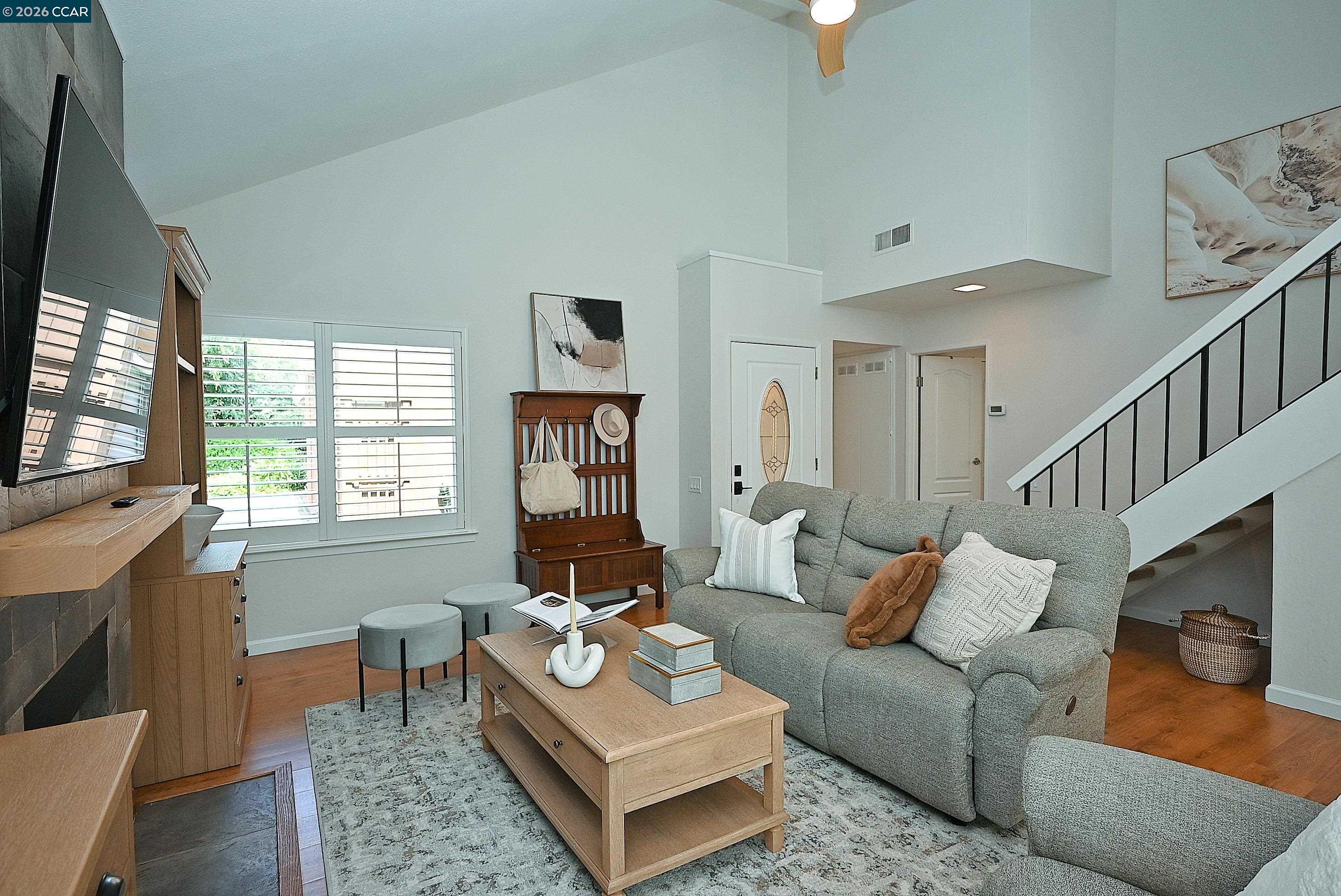4284 Dubhe Court Concord, CA 94521 - Photo 6 of 46 a living room with furniture and a flat screen tv
