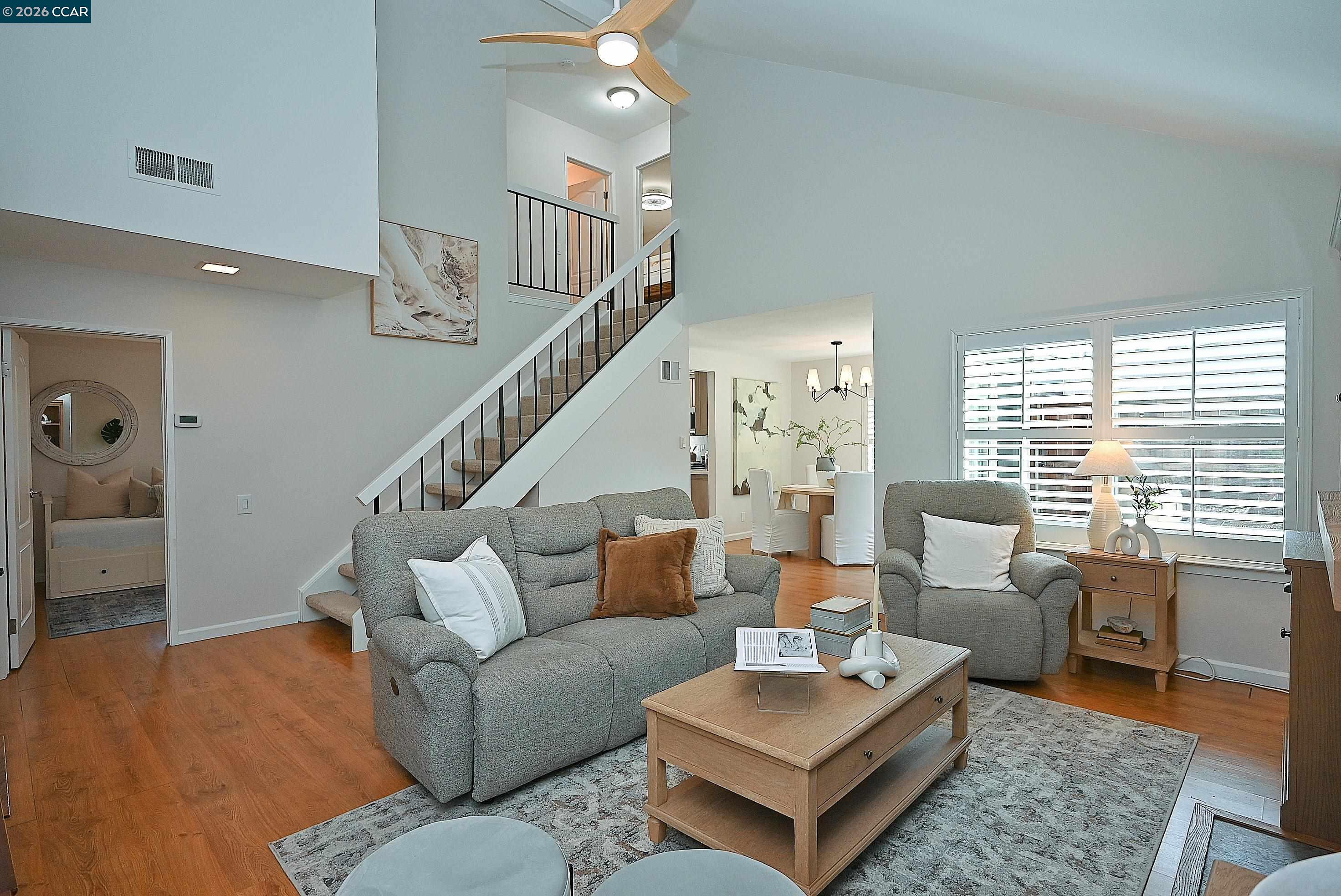 4284 Dubhe Court Concord, CA 94521 - Photo 7 of 46 a living room with furniture potted plant and a large window