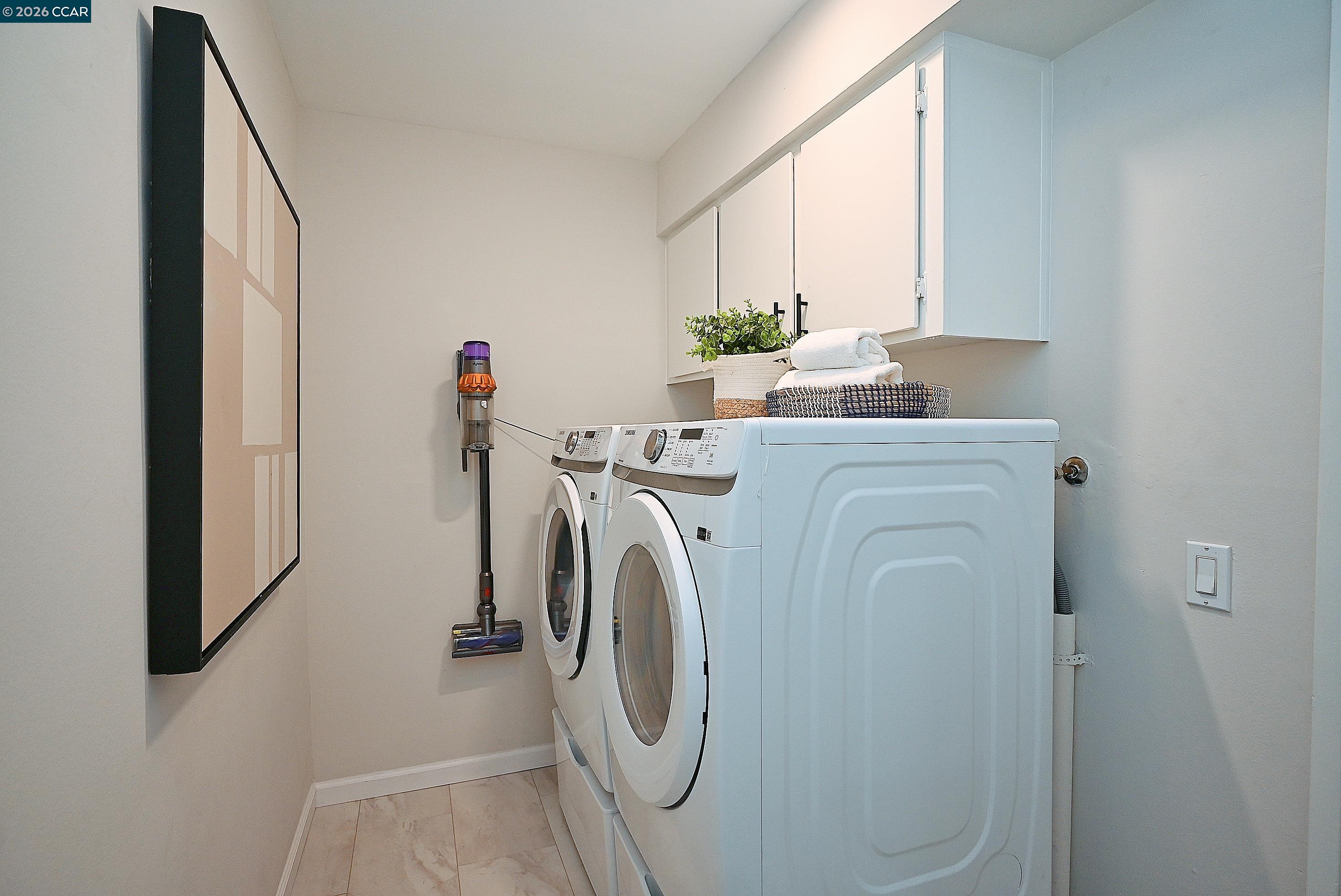 4284 Dubhe Court Concord, CA 94521 - Photo 10 of 46 a utility room with dryer and washer