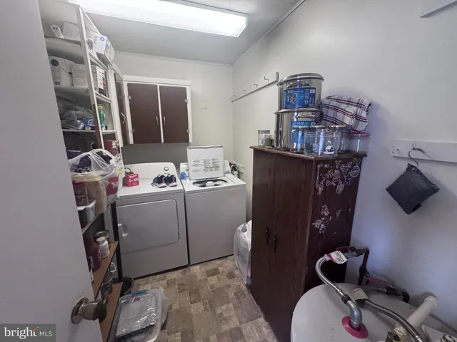 a kitchen with a stove and a refrigerator