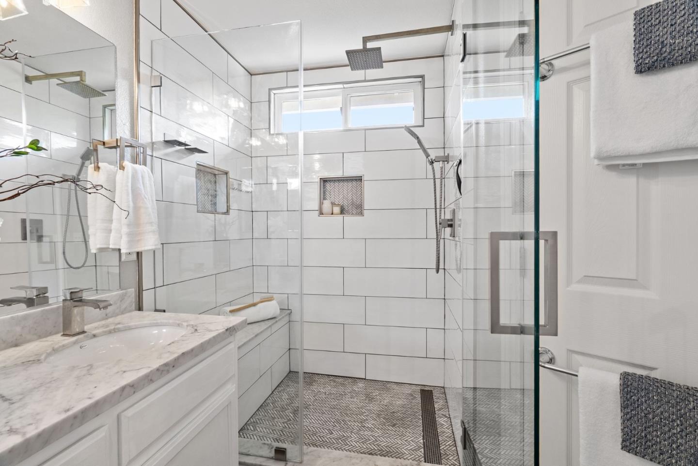 56 Lavender Court Tracy, CA 95376 - Photo 25 of 56 a bathroom with a granite countertop shower a sink and vanity