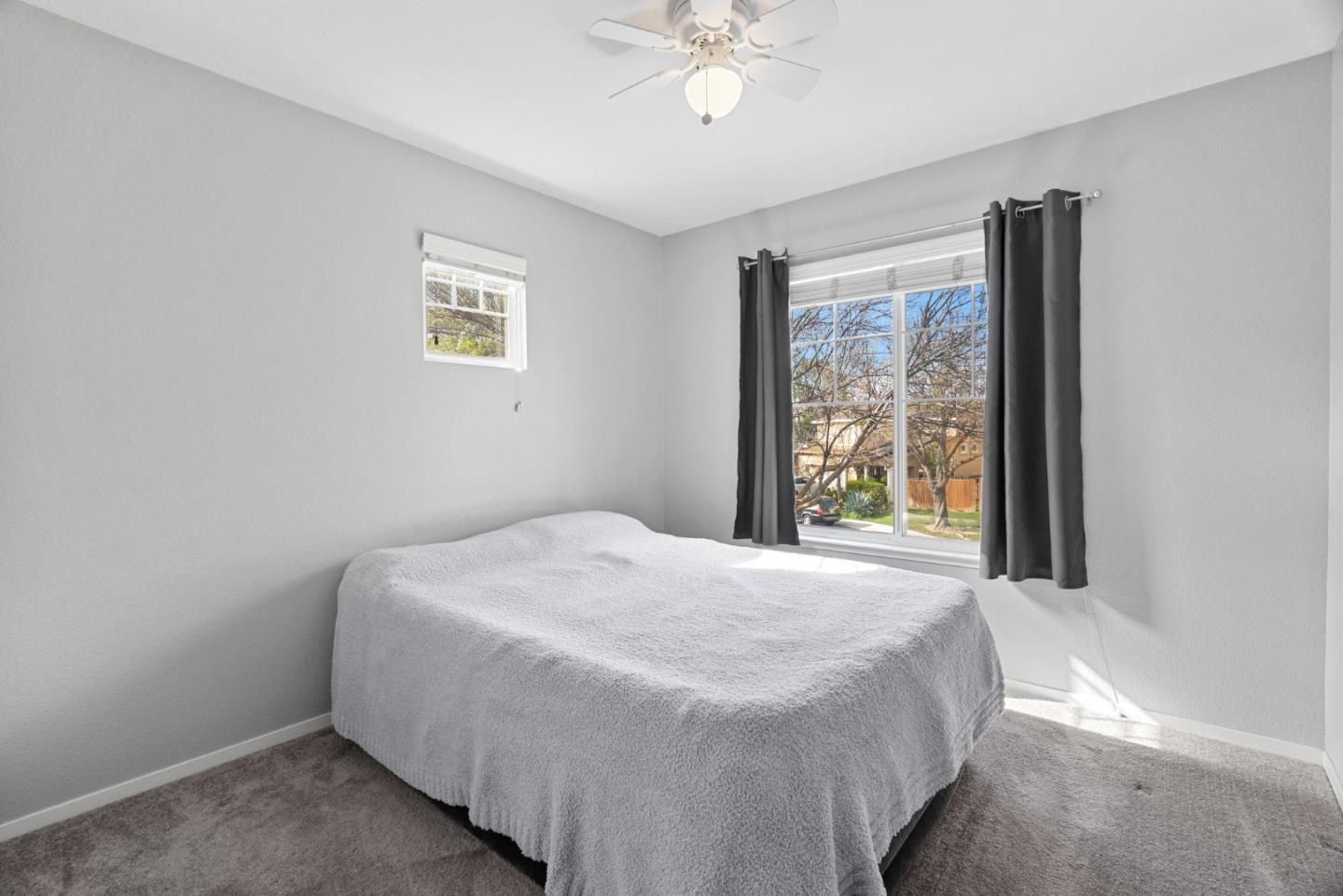 56 Lavender Court Tracy, CA 95376 - Photo 28 of 56 a bedroom with a bed and a window