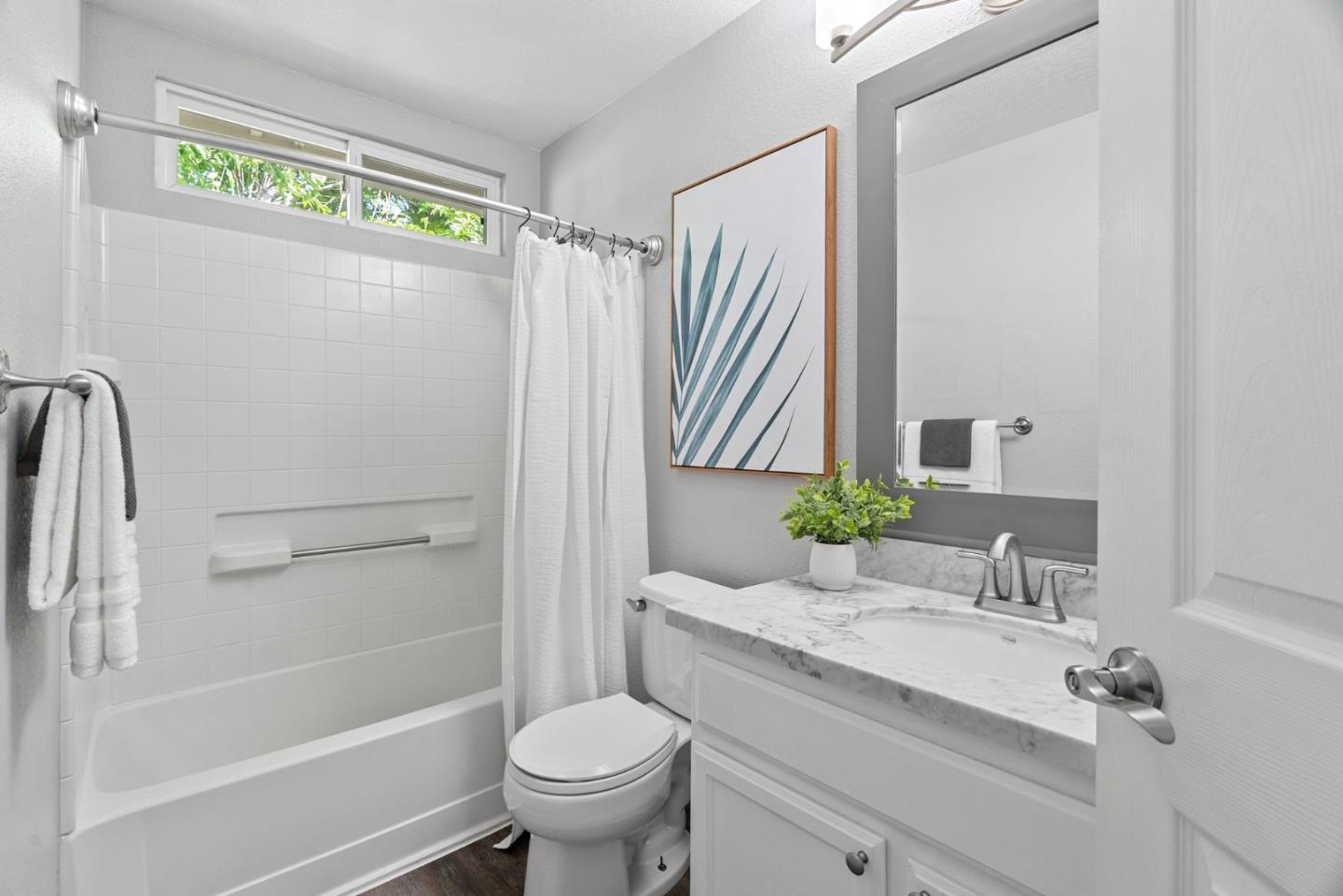 56 Lavender Court Tracy, CA 95376 - Photo 30 of 56 a bathroom with a granite countertop sink toilet and shower