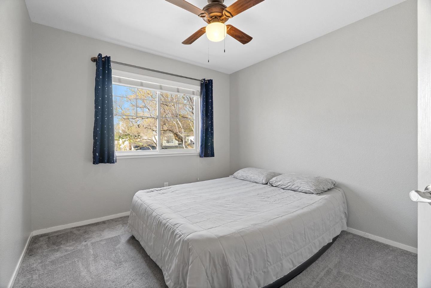 56 Lavender Court Tracy, CA 95376 - Photo 31 of 56 a bedroom with a bed and window